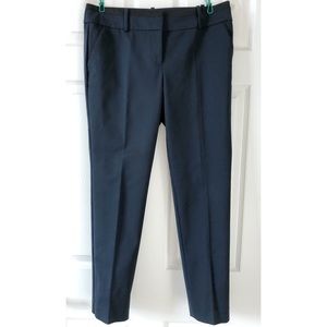 Ann Taylor navy pants with black trim details.